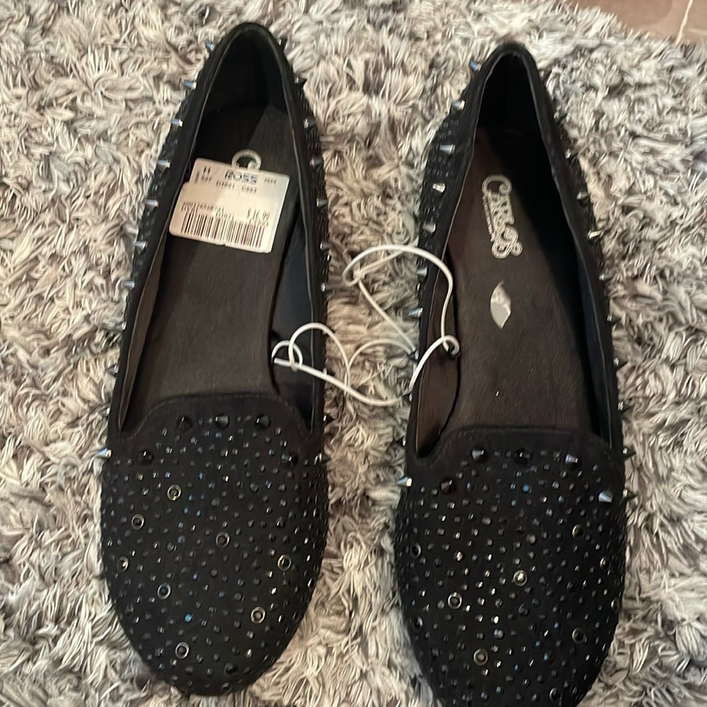 Brand new black flats, never worn